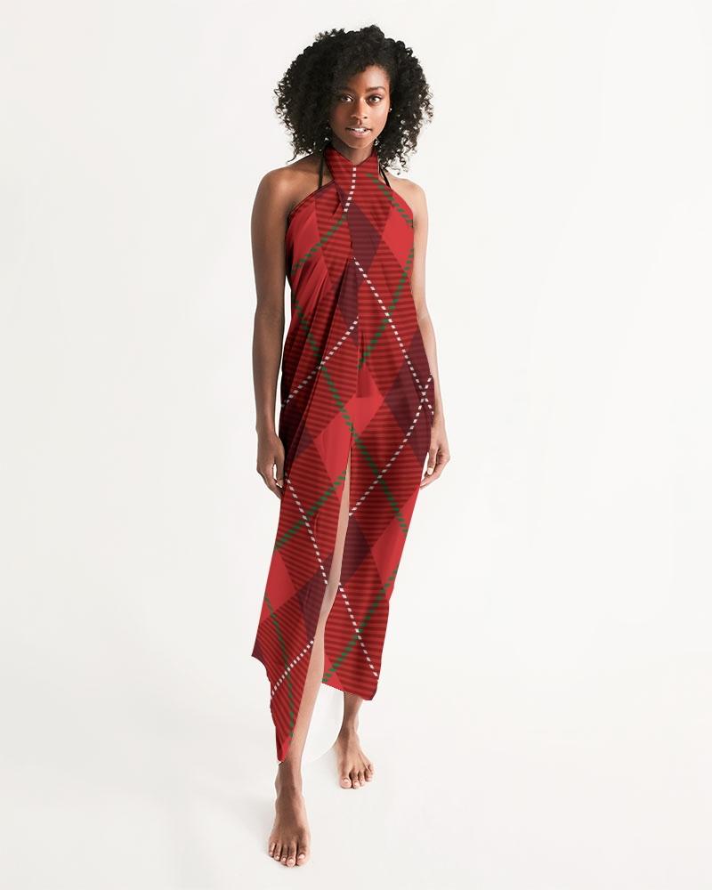 A stylish sheer plaid red swimsuit cover up draped elegantly, showcasing its lightweight fabric and self-tie closure.