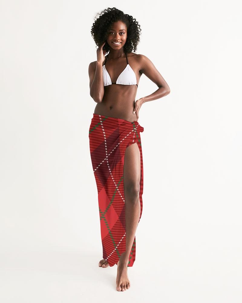 A stylish sheer plaid red swimsuit cover up draped elegantly, showcasing its lightweight fabric and self-tie closure.