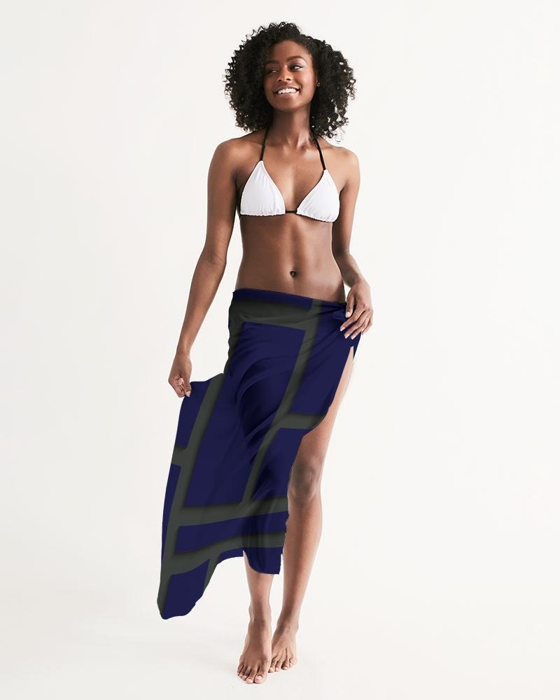 A sheer sarong swimsuit cover up wrap featuring a geometric dark blue and green design, perfect for beach and poolside wear.