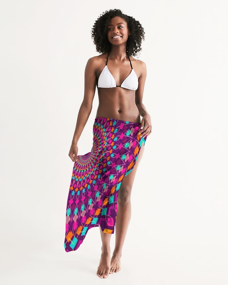 A vibrant purple kaleidoscope patterned sheer sarong swimsuit cover up wrap, elegantly draped on a model, showcasing its lightweight and flowy fabric.