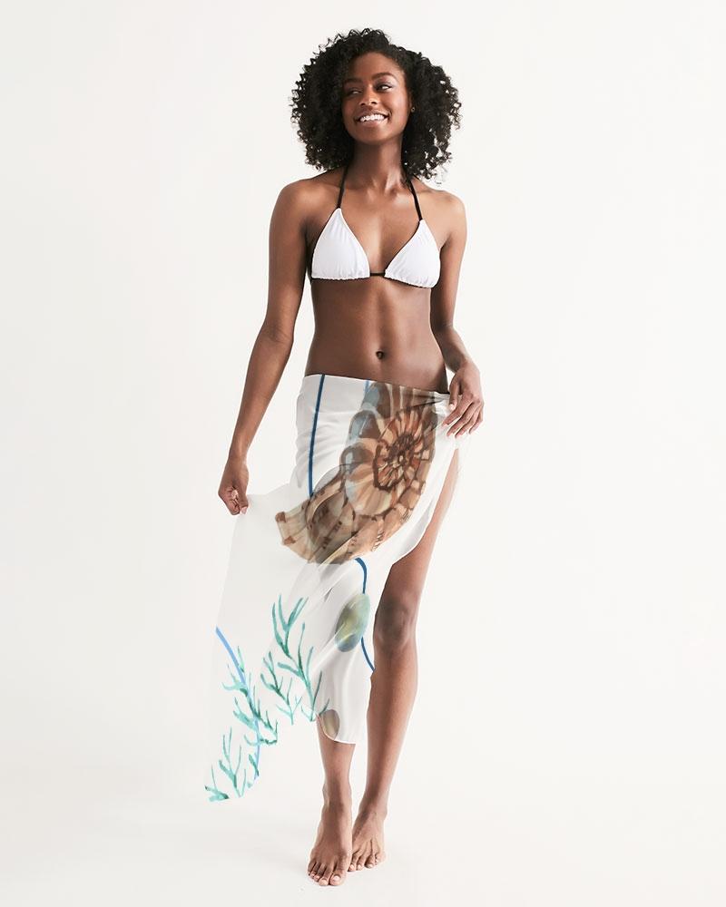 A lightweight sheer sarong swimsuit cover up wrap in white seashell design, perfect for beach or poolside wear.