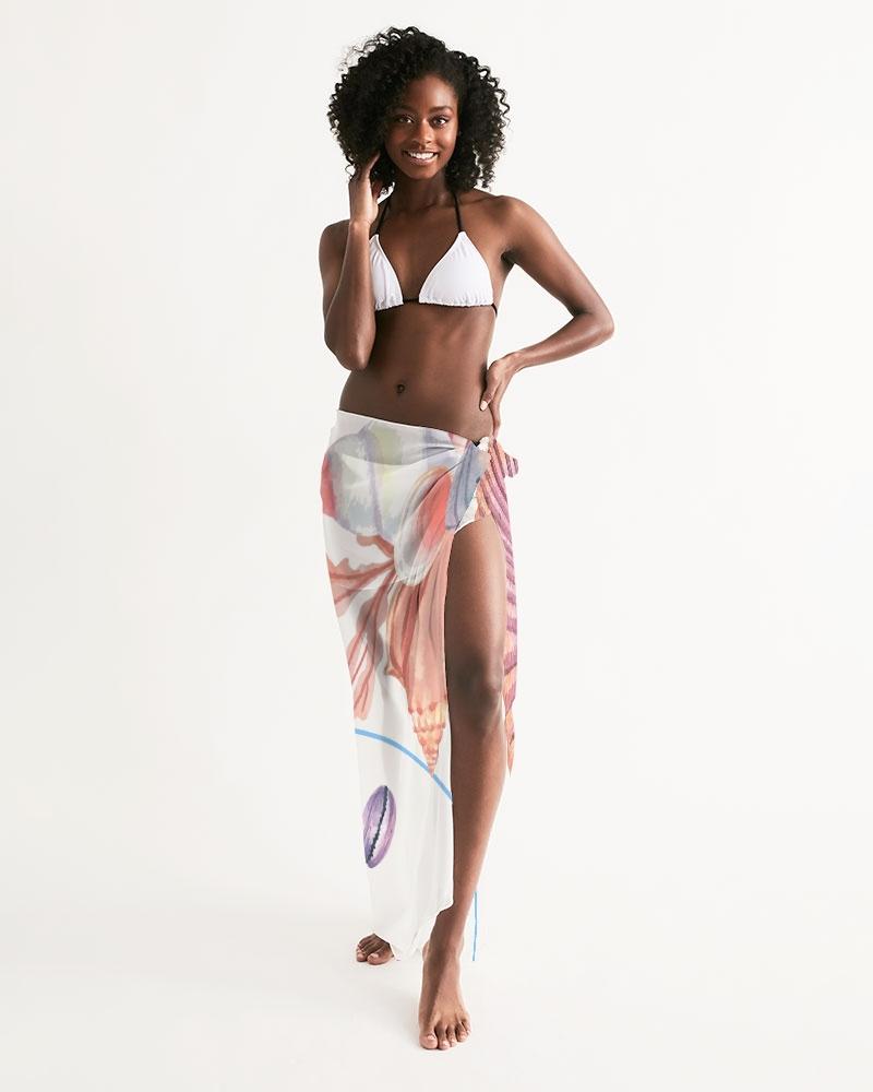 A lightweight and flowy sheer swimsuit cover-up featuring ocean-themed prints, perfect for beach or poolside wear.