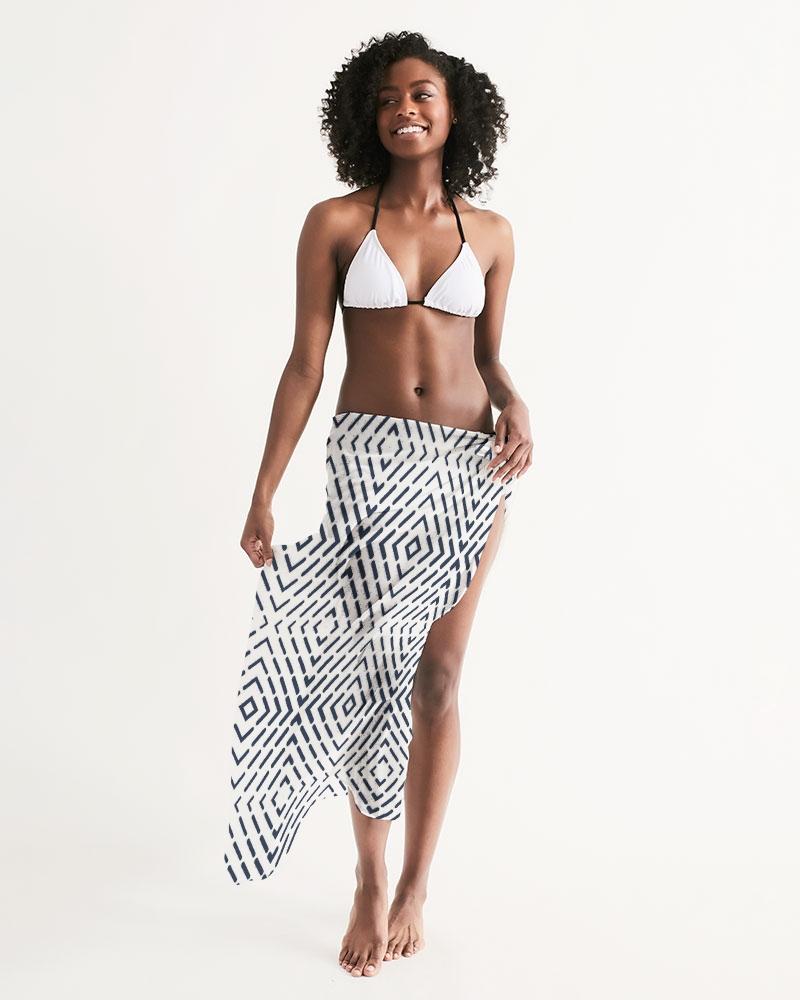 A stylish sheer swimsuit cover up featuring a black and white abstract print, perfect for beach or poolside wear.