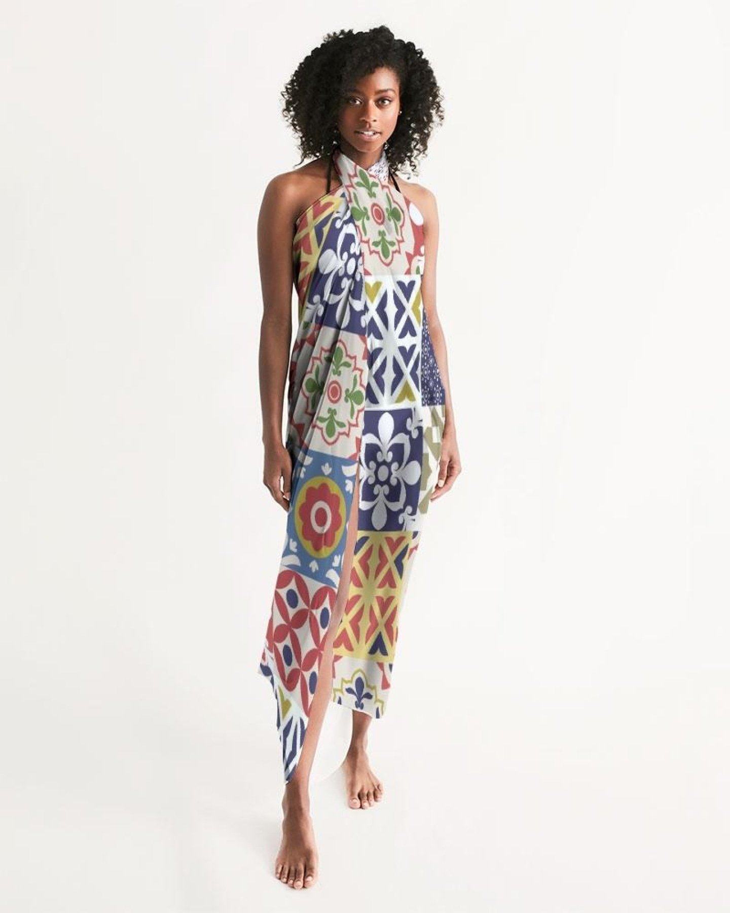 A vibrant multicolor sheer swimsuit cover up with an abstract print, featuring a self-tie closure, perfect for beach or poolside wear.