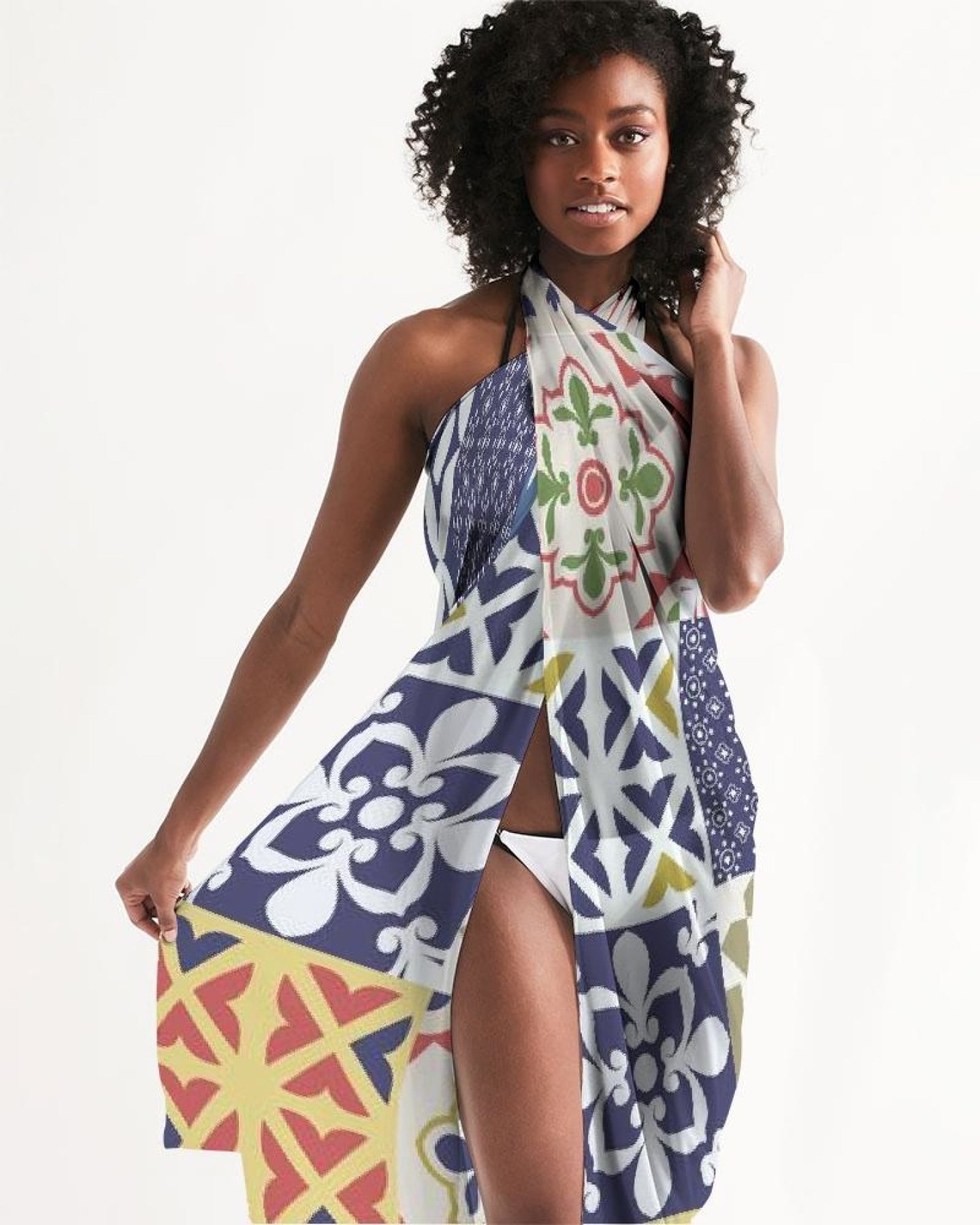 A vibrant multicolor sheer swimsuit cover up with an abstract print, featuring a self-tie closure, perfect for beach or poolside wear.