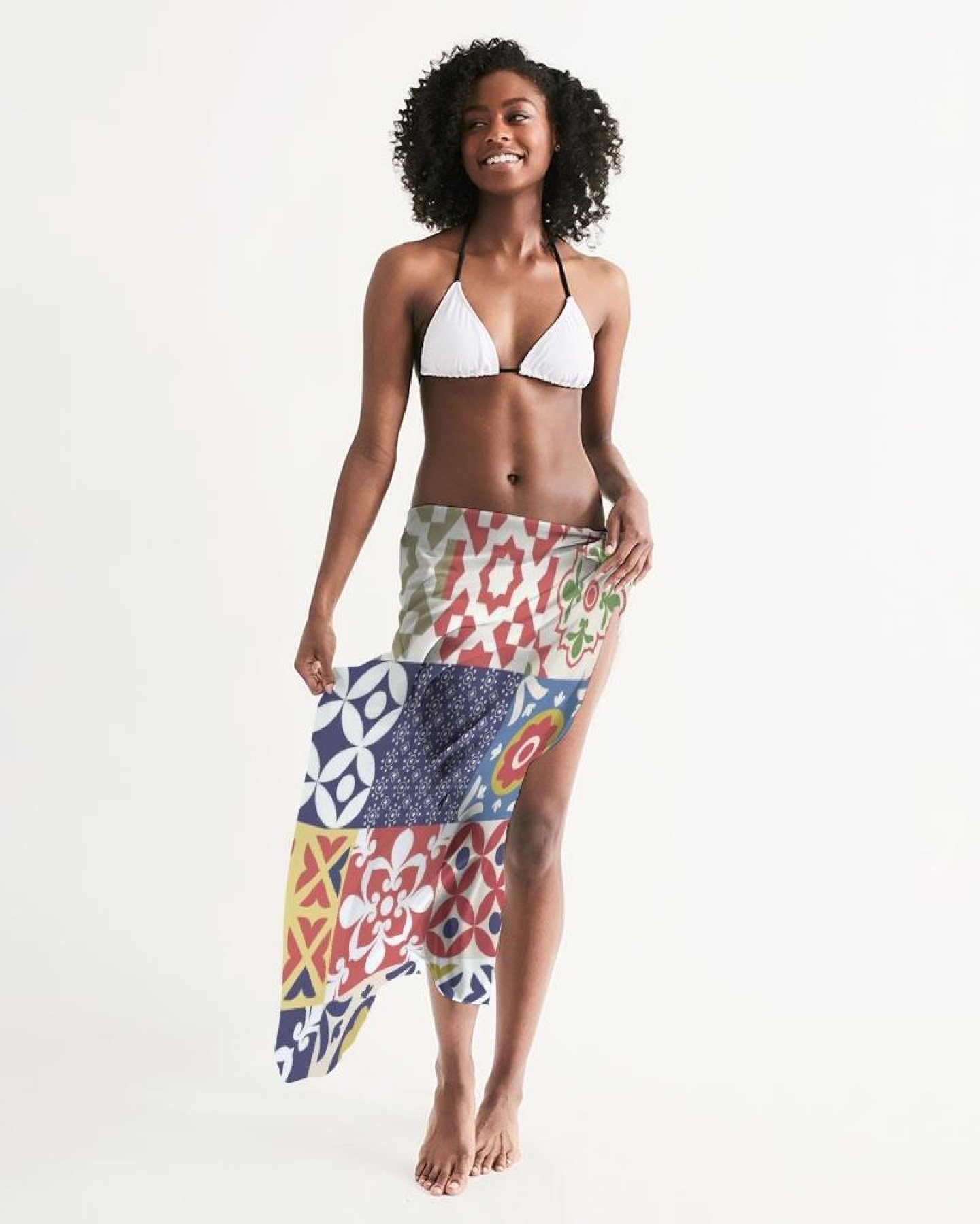 A vibrant multicolor sheer swimsuit cover up with an abstract print, featuring a self-tie closure, perfect for beach or poolside wear.