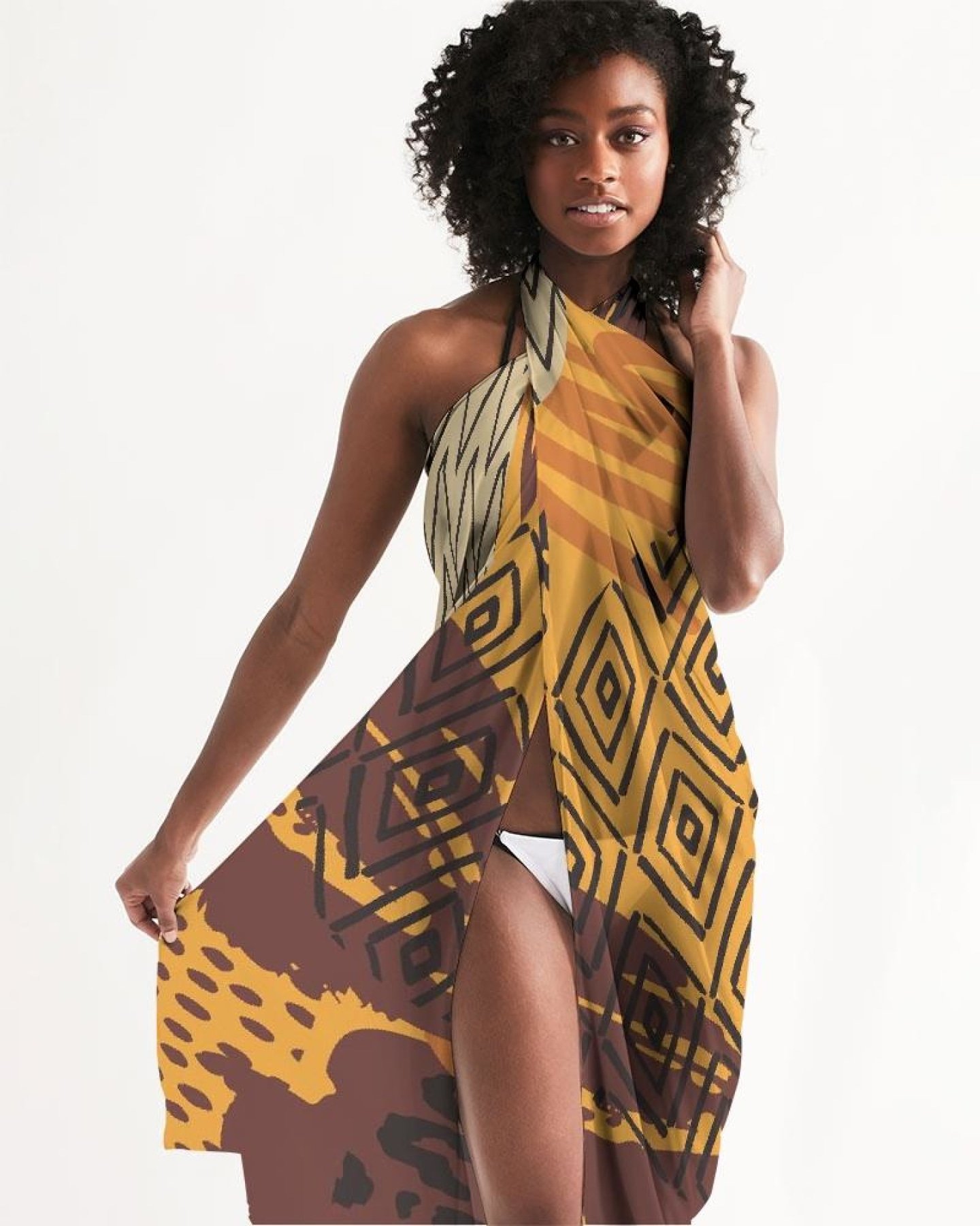 A vibrant orange sheer swimsuit cover up with an abstract print, showcasing its lightweight fabric and self-tie closure, perfect for beach or pool wear.