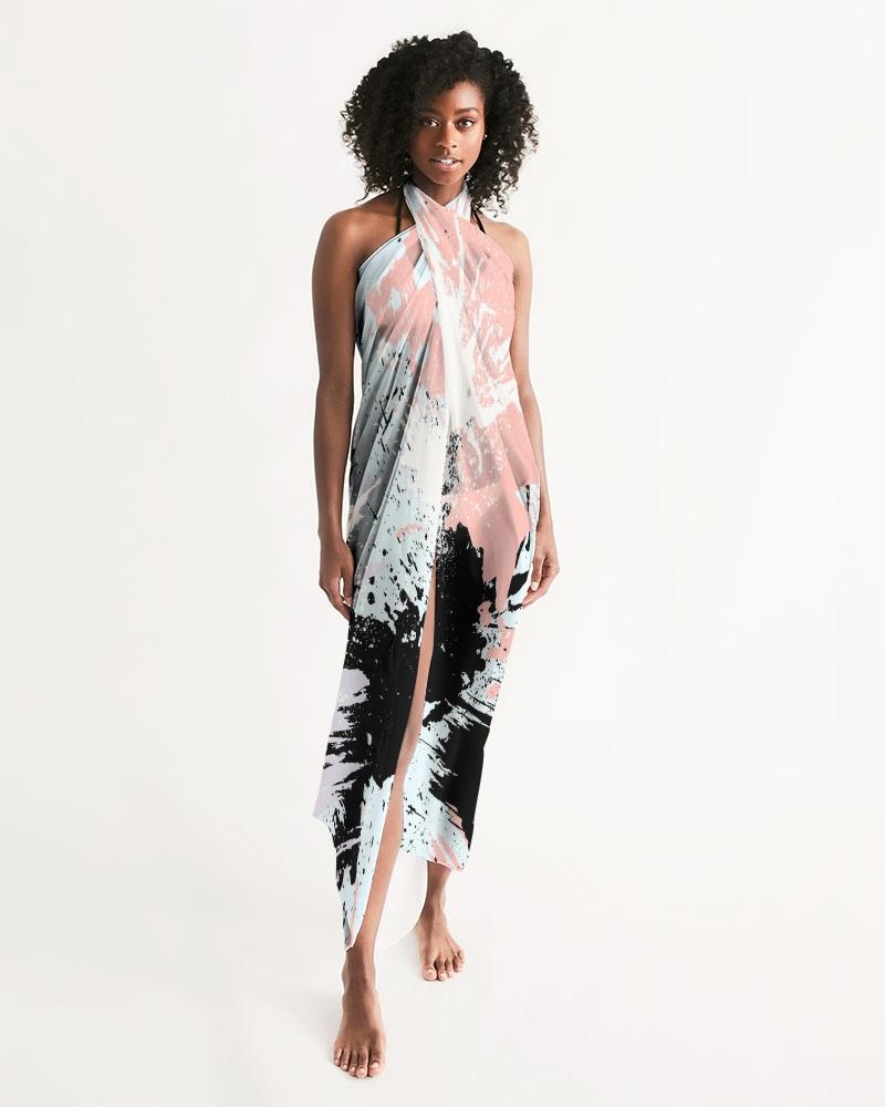 A lightweight sheer swimsuit cover up featuring an abstract pastel paint splatter design, perfect for beach or pool wear.