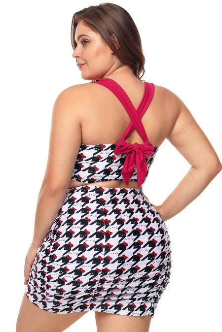 A stylish plus size skirt swimwear featuring a cute black and white kitty print, with padded underwire cups and a matching high waist bodycon skirt.