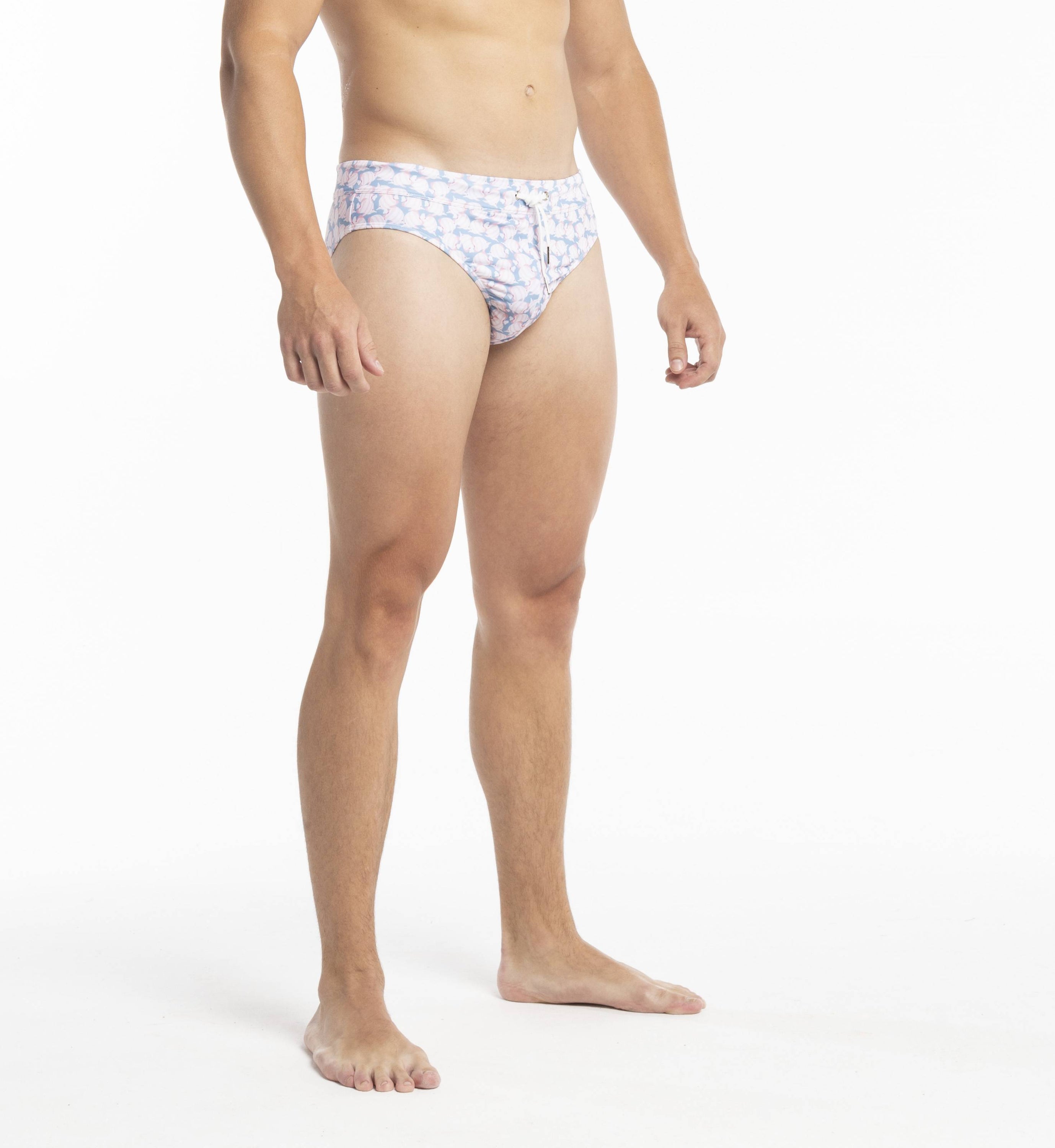 Stylish Swim Briefs featuring a vibrant fish pattern, made from stretchy and breathable fabric, perfect for summer activities.