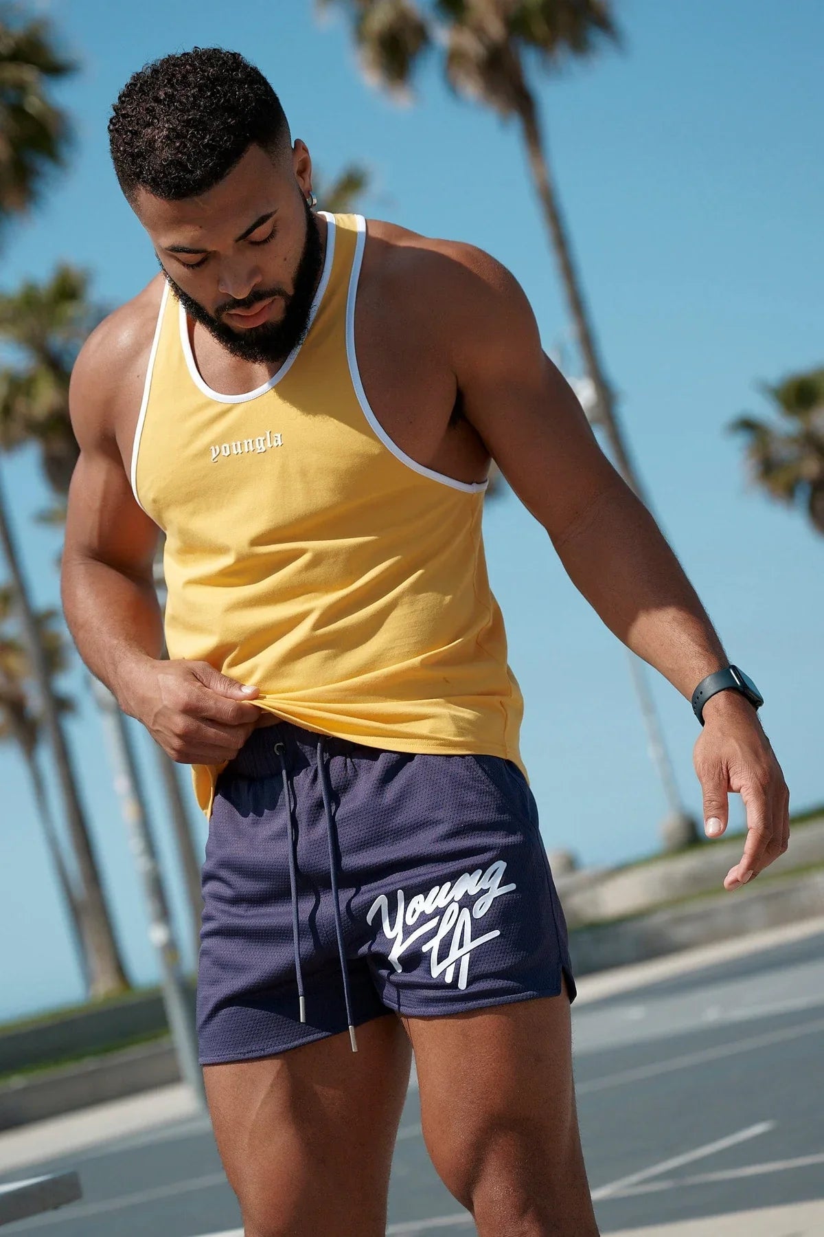 Young LA Trendy Beach Shorts for men, featuring stylish prints and an elastic waist for comfort.