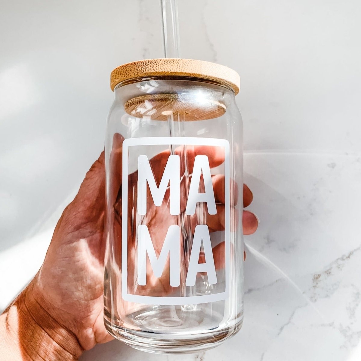 16 oz Beer Can Glass Mama showcasing a sleek design with a unique vinyl pattern, perfect for serving cold drinks.