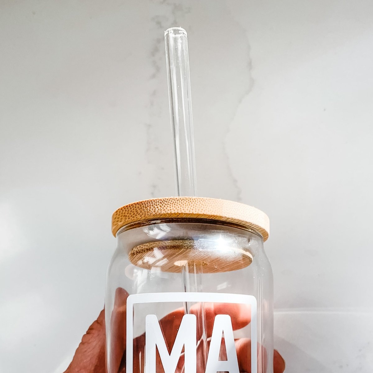 16 oz Beer Can Glass Mama showcasing a sleek design with a unique vinyl pattern, perfect for serving cold drinks.