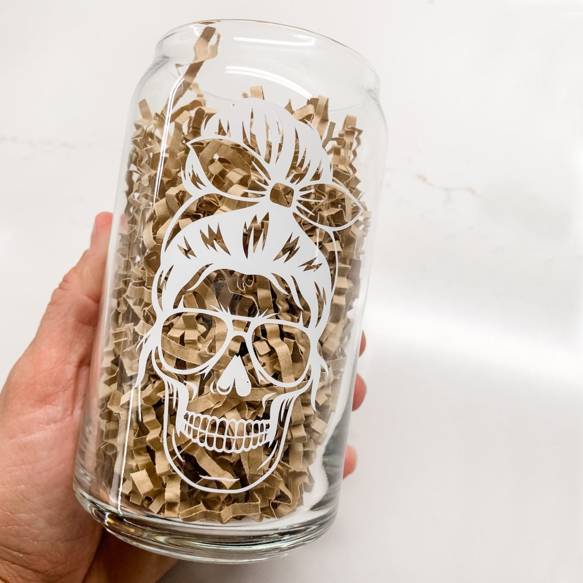 16 oz Beer Can Glass featuring a unique Mom Life Skull design, perfect for serving cold drinks.