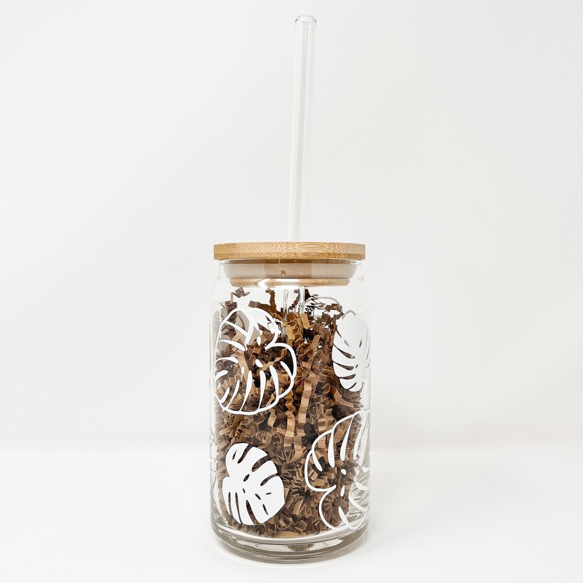 16 oz Beer Can Glass featuring Monstera Leaves design, showcasing a clear glass with a stylish vinyl print.