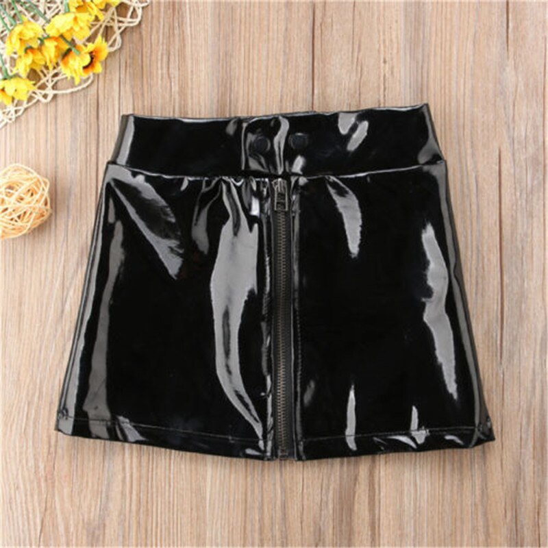 Shiny black mini skirt.