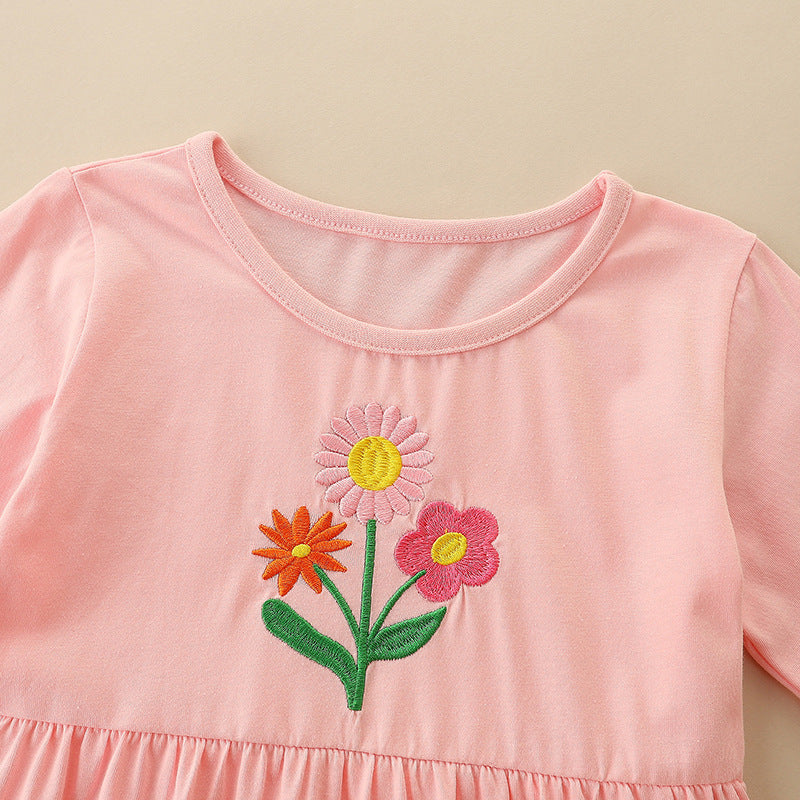 Adorable floral embroidered dress in pink for girls, featuring a round neck and elegant floral patterns.