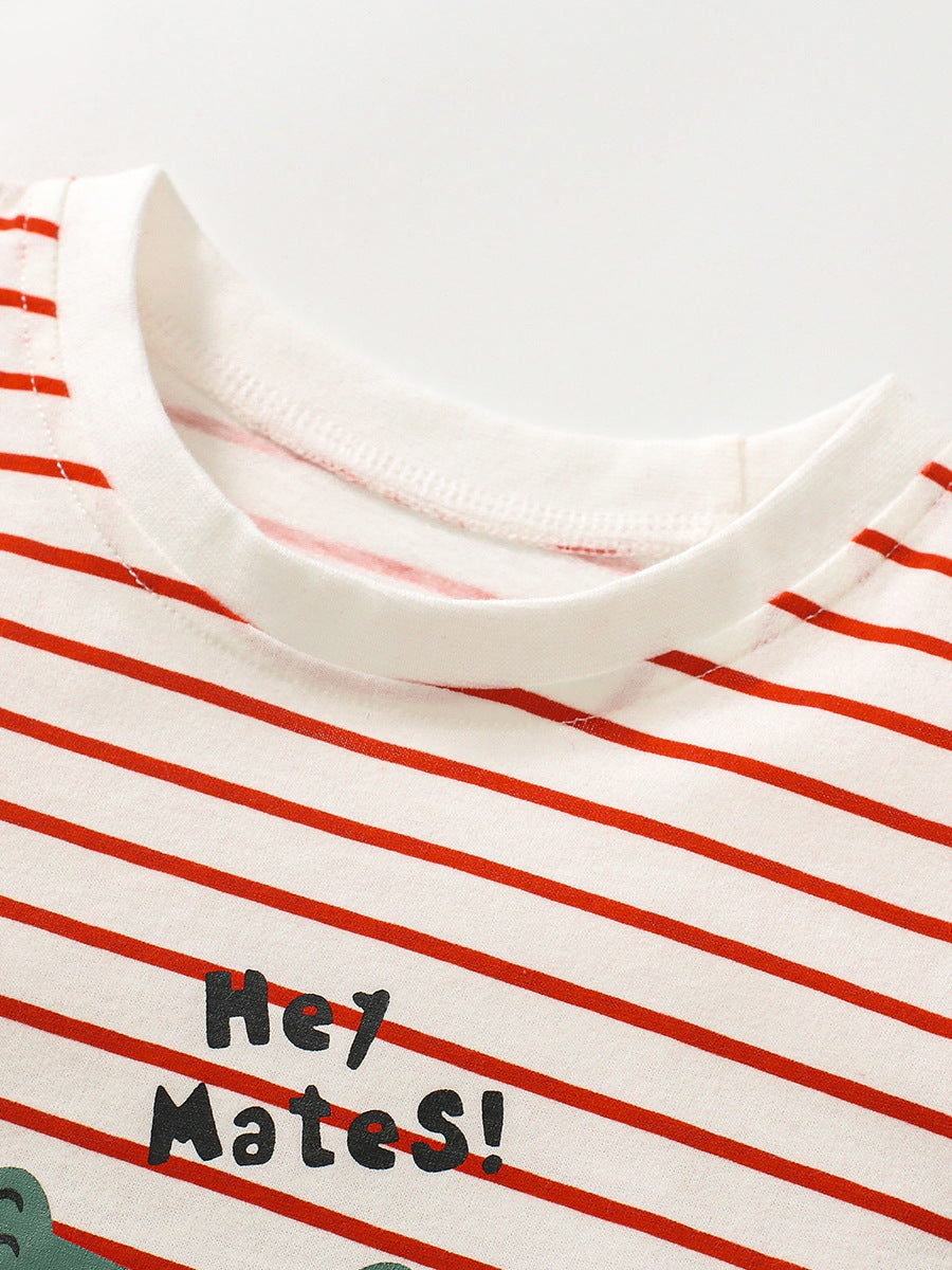 A vibrant red unisex kids striped t-shirt featuring a playful alligator cartoon print, perfect for summer wear.