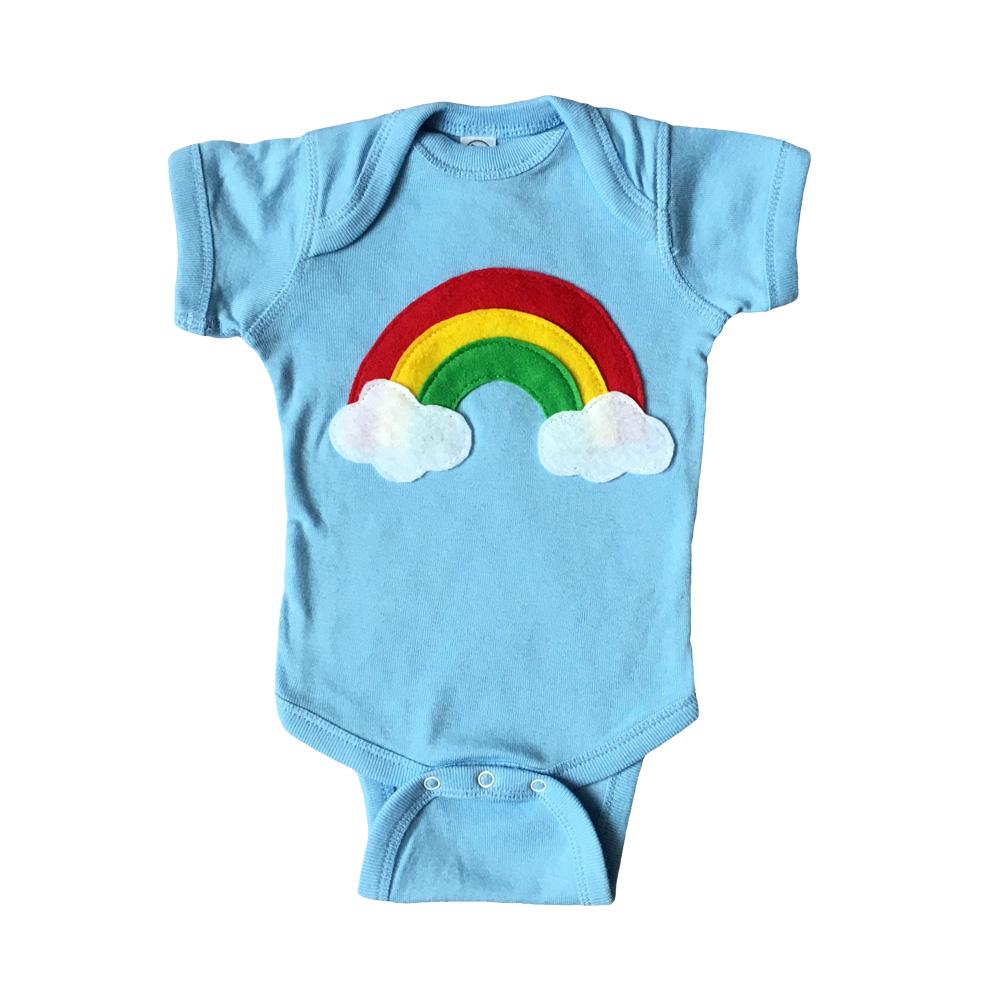 Aloha Rainbow Infant Bodysuit featuring a vibrant rainbow design on a soft blue background, handmade with appliquéd felt pieces.