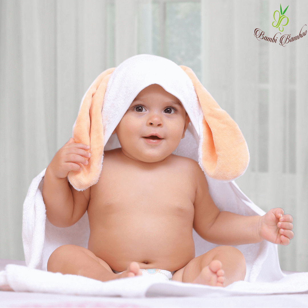 Amber Bunny Hooded Towel with bunny ears and two matching washcloths, made from soft organic bamboo fabric.