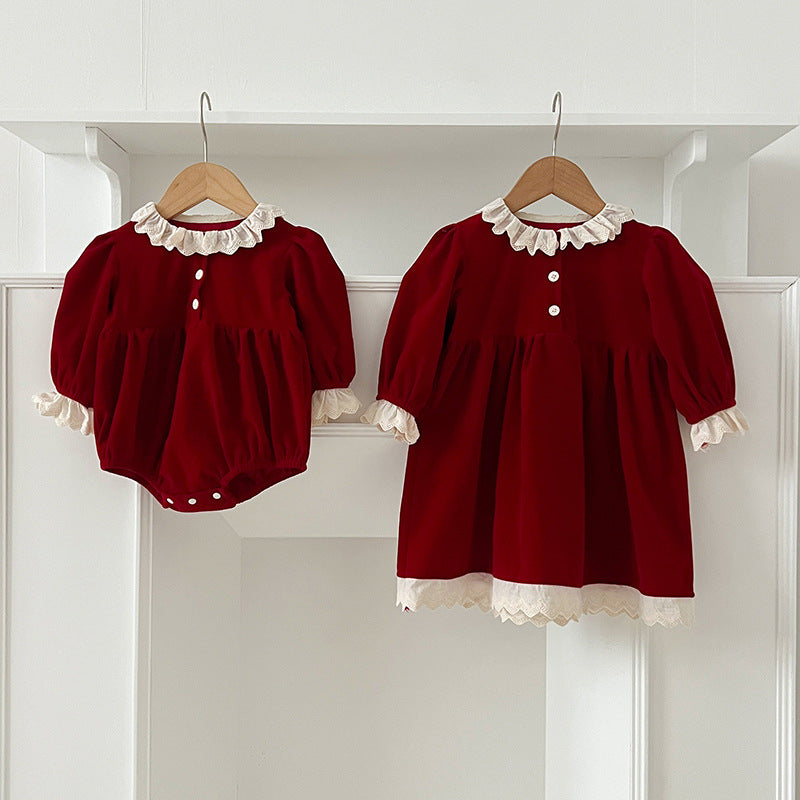 A stylish patchwork dress for baby girls featuring lace trim and long sleeves, available in red and pink colors.