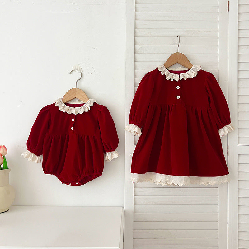 A stylish patchwork dress for baby girls featuring lace trim and long sleeves, available in red and pink colors.