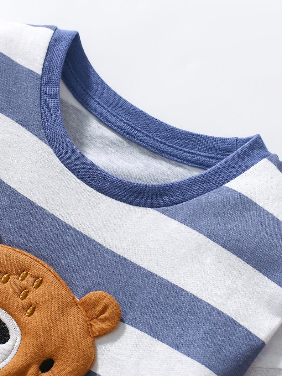 A blue long-sleeved t-shirt for girls featuring a 3D teddy bear design and striped pattern, made from soft cotton material.