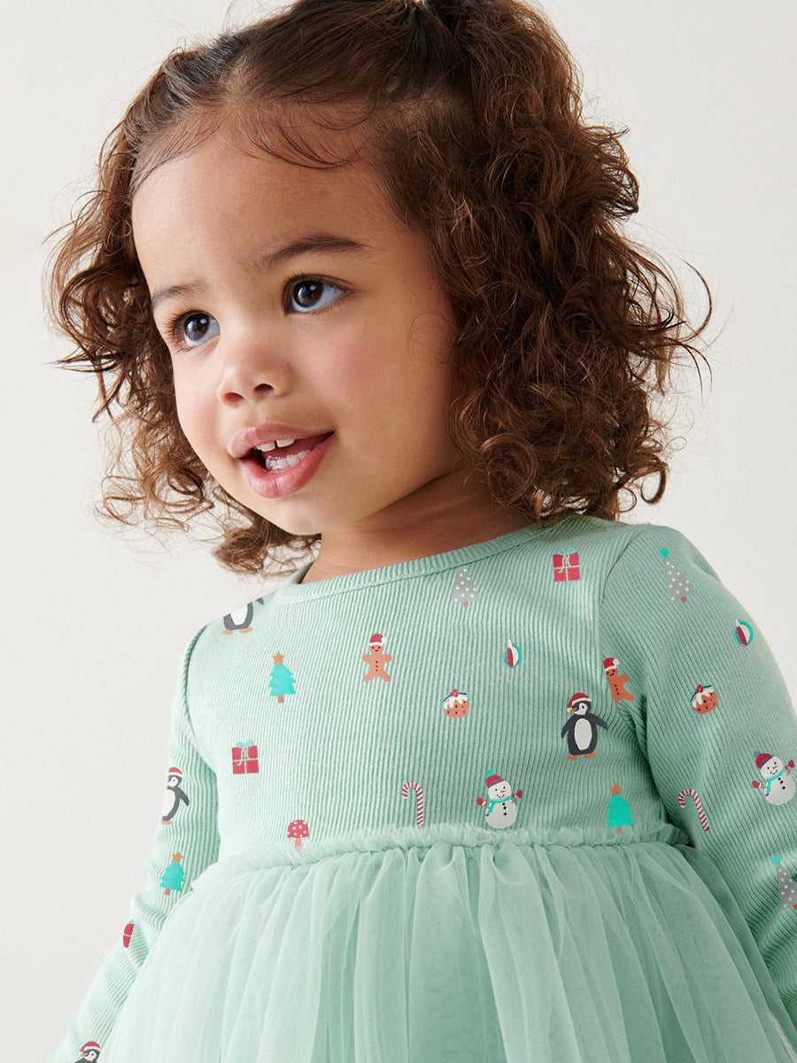 A green crew neck long sleeve top featuring a cartoon Christmas print, designed for girls aged 12 months to 10 years.