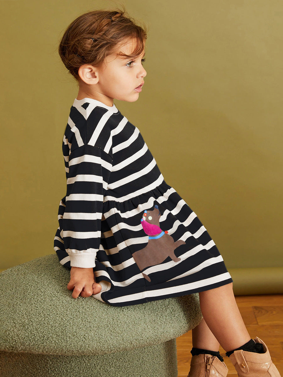 A stylish long sleeve shirt for girls featuring a cartoon dachshund dog pattern, perfect for autumn and spring wear.