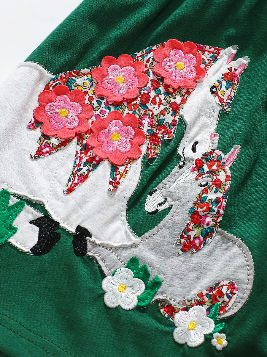 Green crew neck long sleeve top for girls featuring a cartoon floral horse design, perfect for autumn and spring wear.