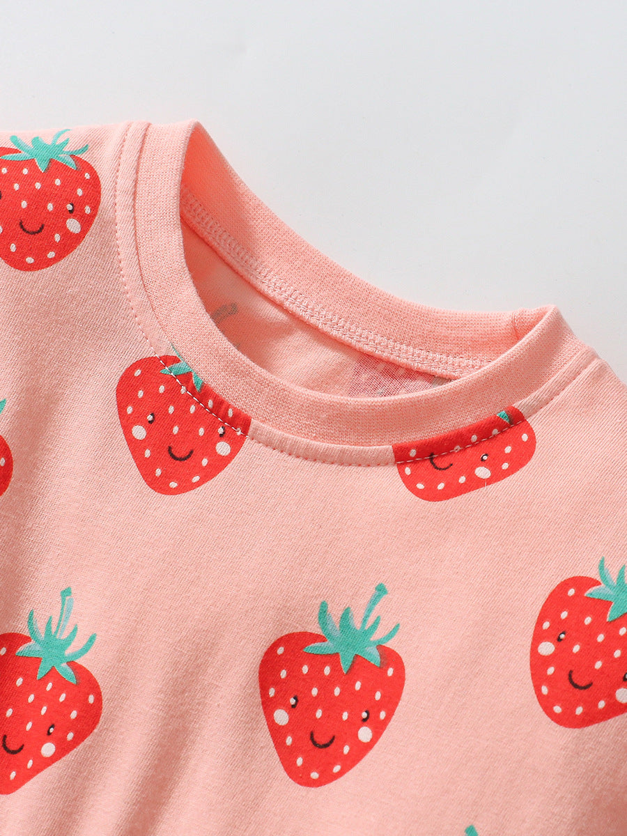 A pink long-sleeved top for girls featuring a cartoon strawberry fruits pattern, made from soft cotton material.