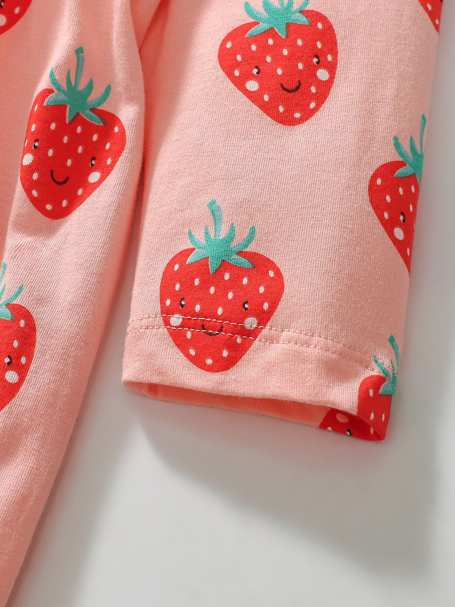 A pink long-sleeved top for girls featuring a cartoon strawberry fruits pattern, made from soft cotton material.