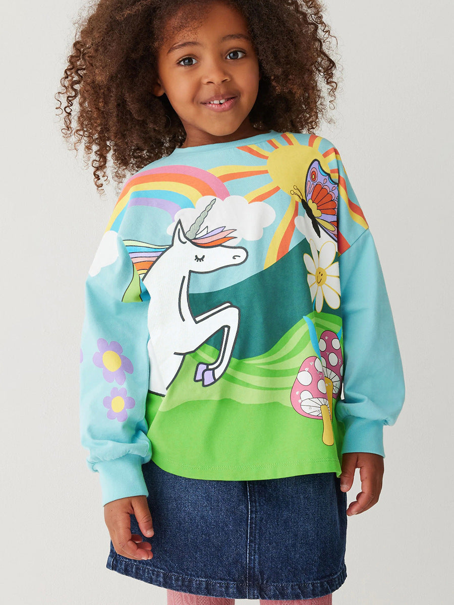 Colorful long-sleeved t-shirt featuring a unicorn cartoon design for girls, made from soft cotton material.