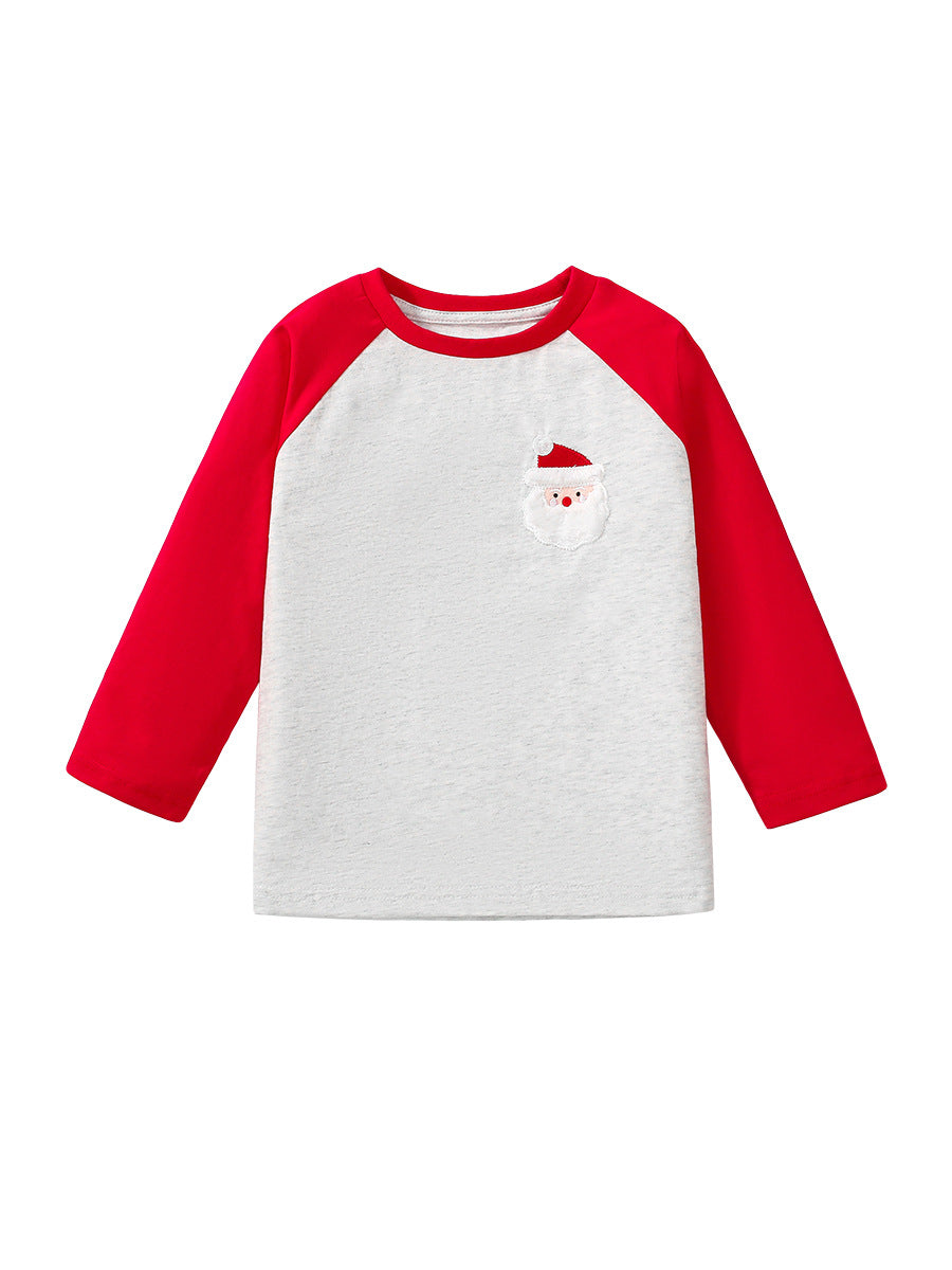 A vibrant red long-sleeve shirt for kids featuring a playful cartoon pattern, perfect for Christmas celebrations.