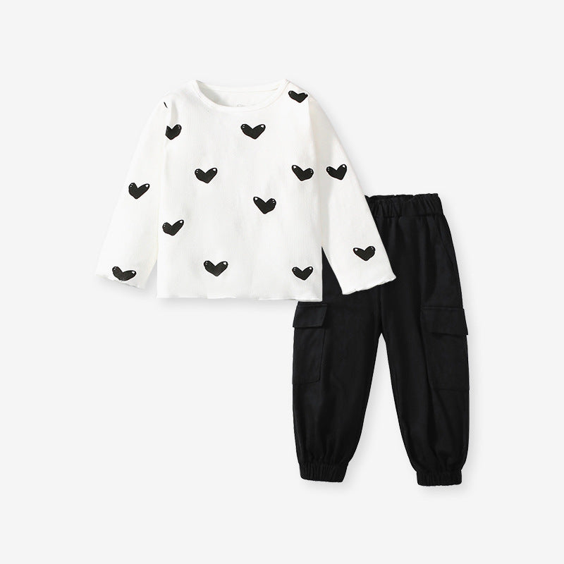 Girls casual black long sleeve shirt with heart print, perfect for spring and autumn wear.