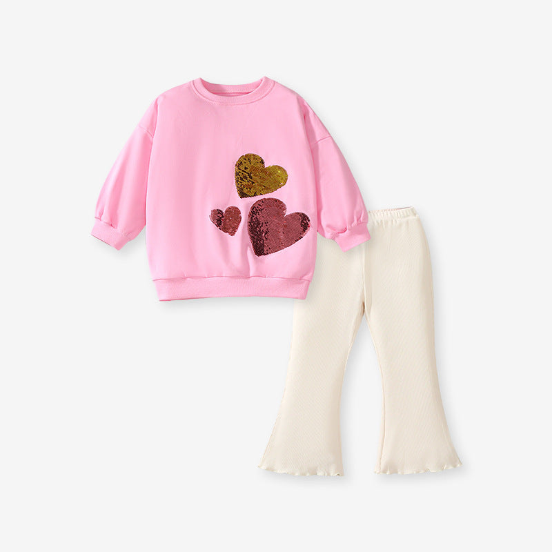 Pink long sleeves top for girls featuring a sequin heart design, made from cotton and polyester, perfect for spring and autumn wear.