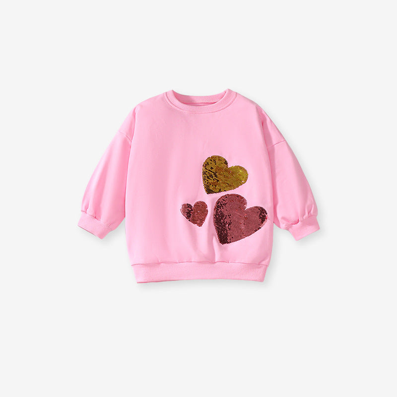 Pink long sleeves top for girls featuring a sequin heart design, made from cotton and polyester, perfect for spring and autumn wear.