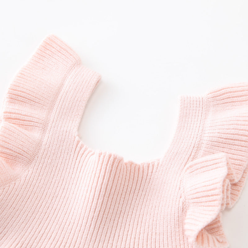 A cute summer top for baby girls featuring fly sleeves in solid pink and blue colors, made from soft cotton and polyester.