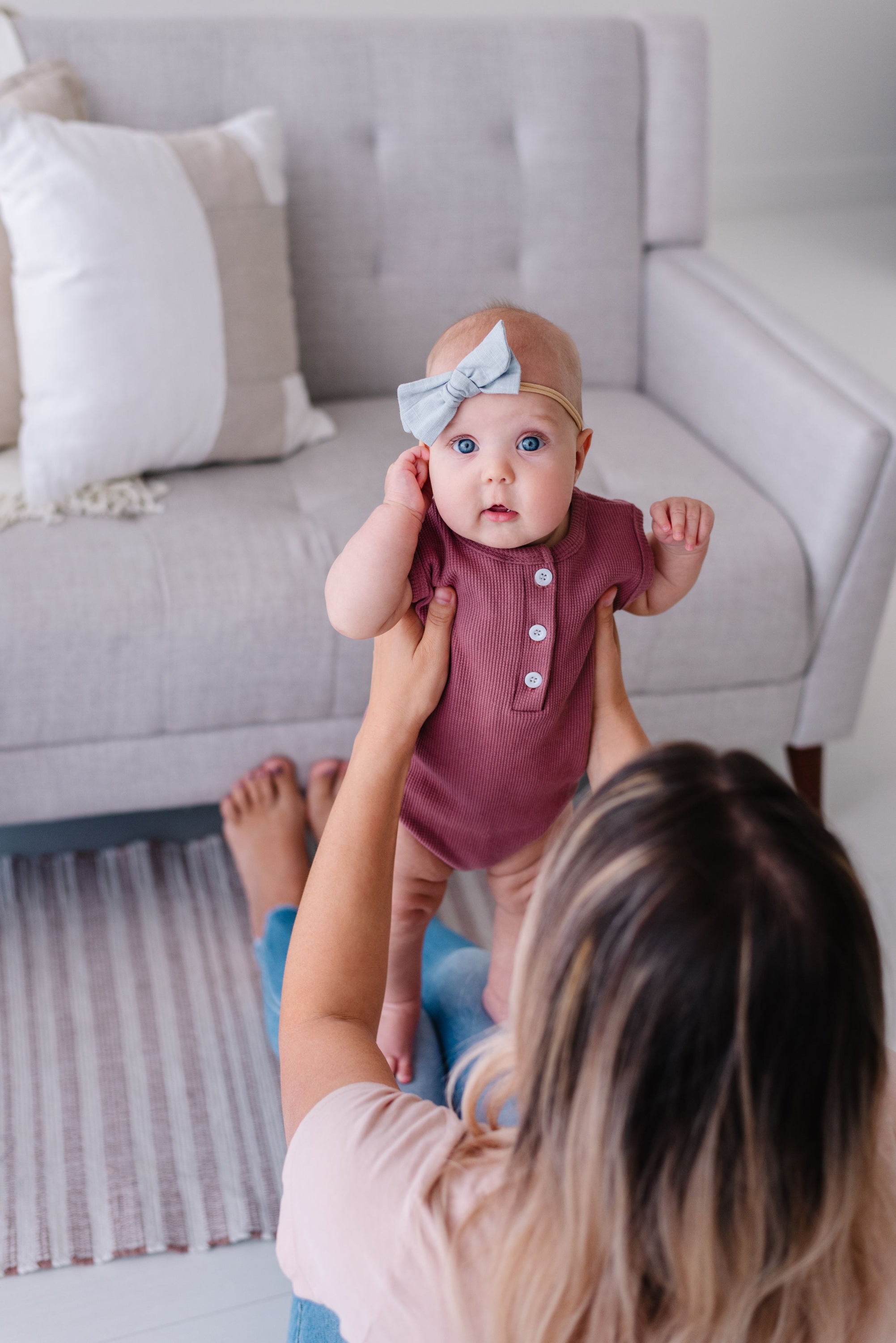 Arizona Sleeveless Romper in sunset hues, made from soft waffle cotton, perfect for babies.