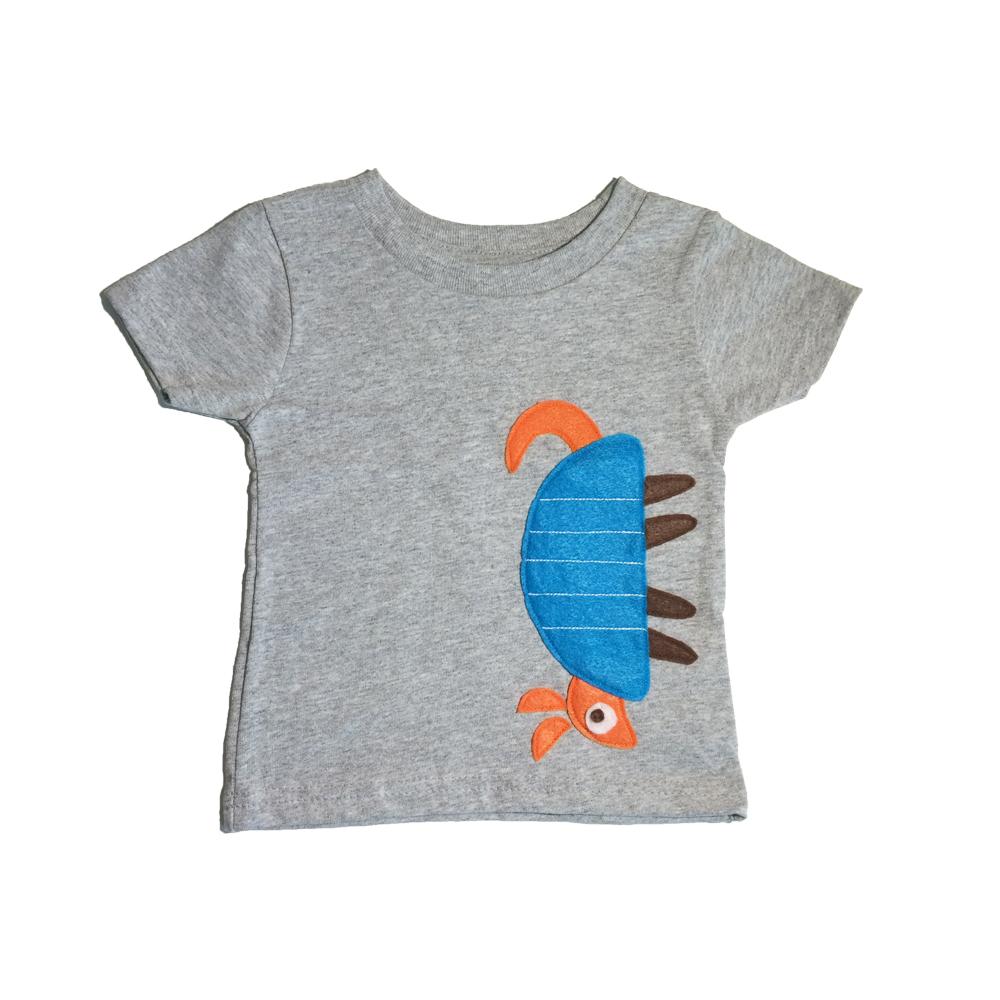 A handmade Armadillo T-shirt featuring a unique felt armadillo design, proudly made in Austin, Texas.