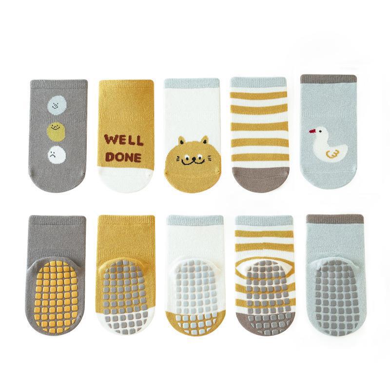 A pair of Autumn Adorable Cartoon Graphic Non-Slip Socks in various colors, featuring playful cartoon designs suitable for children.