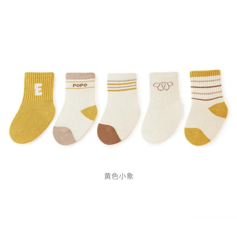 A collection of colorful baby socks featuring cartoon prints in pink, blue, green, yellow, and grey, suitable for both boys and girls.