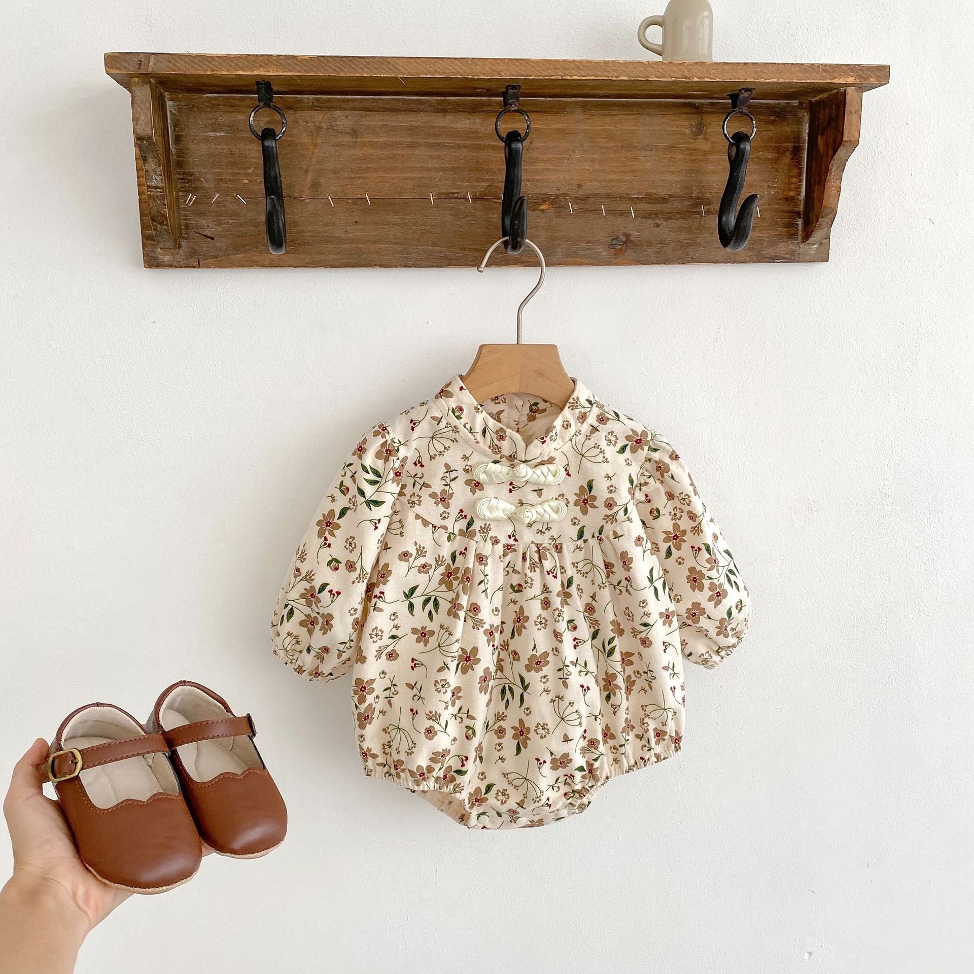 Autumn Floral Pattern Chinese Style Baby Onesies in brown cotton, featuring a charming floral design for baby girls.