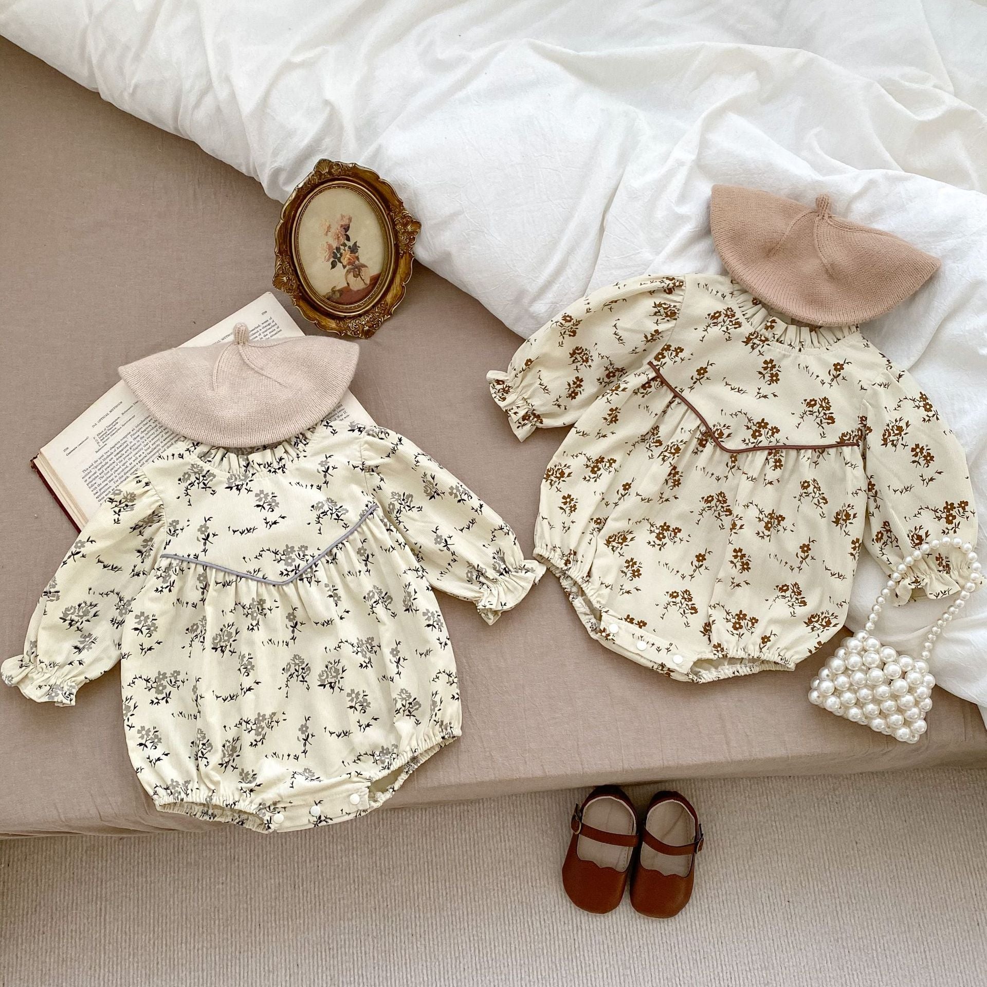 Autumn Floral Pattern Fashion Triangle Onesies in beige and brown for baby girls, showcasing a charming floral design.