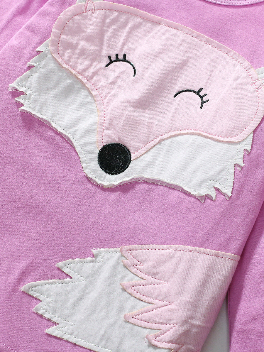 A purple long-sleeved t-shirt for girls featuring a cute fox cartoon pattern, made from soft cotton material.