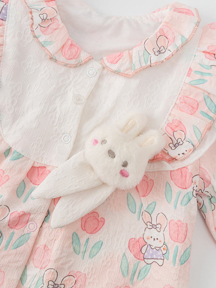 A pink baby girl's outfit featuring a floral and rabbit pattern, perfect for autumn and spring seasons.