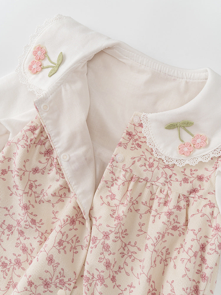 A pink floral pattern romper for baby girls, featuring a single-breasted design, made from soft cotton, perfect for spring and autumn.