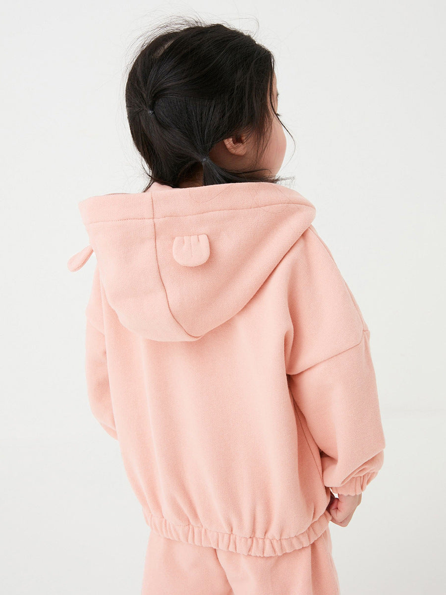 A cozy pink hoodie for baby girls, featuring long sleeves and a solid color design, perfect for autumn and winter wear.