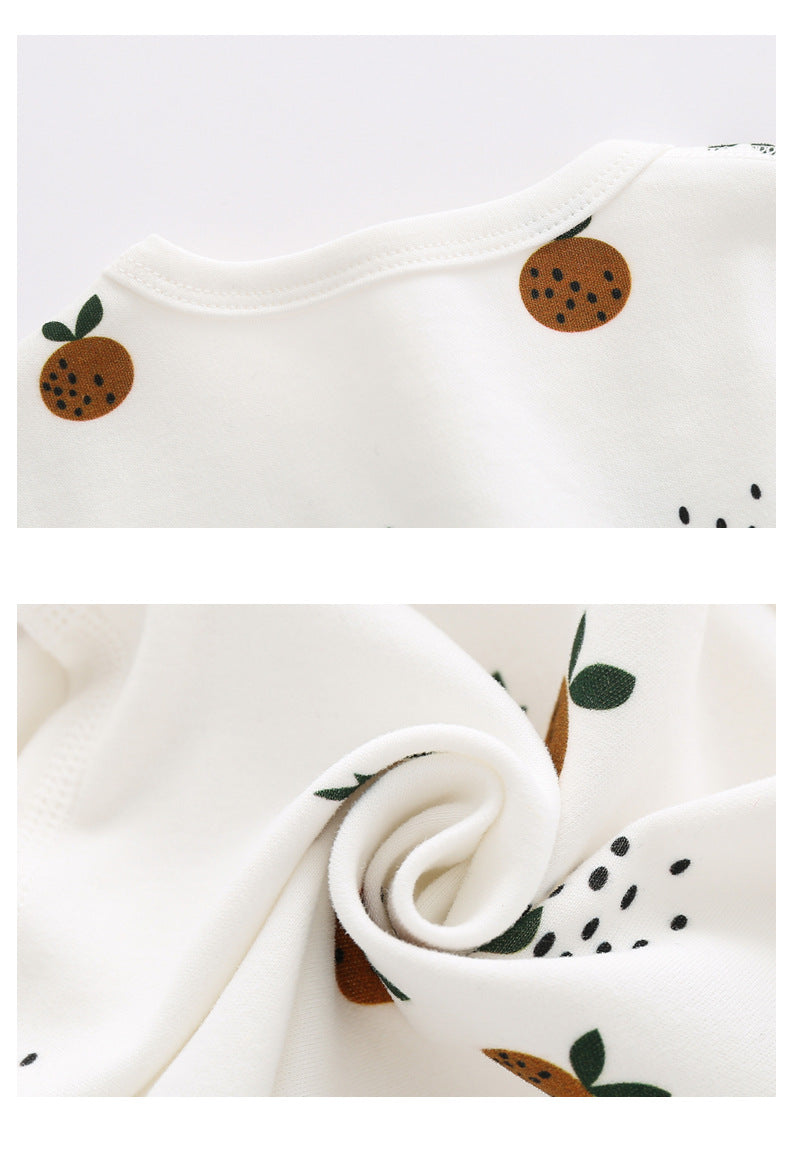 Baby Allover Fruit Graphic top made of 100% organic cotton with side snap buttons, featuring colorful fruit designs.