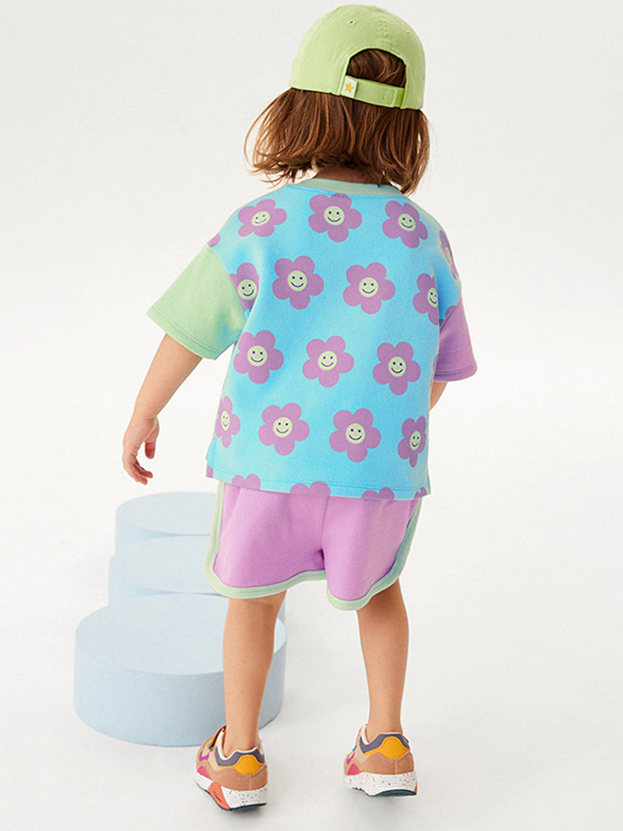 Baby and kids girls floral cartoon top and shorts set in purple, featuring vibrant floral and cartoon patterns, perfect for summer casual wear.